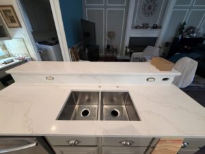 Kitchen countertop with a refined finish and double stainless-steel sink