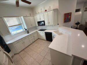 Kitchen upgraded with light countertops and a clean design